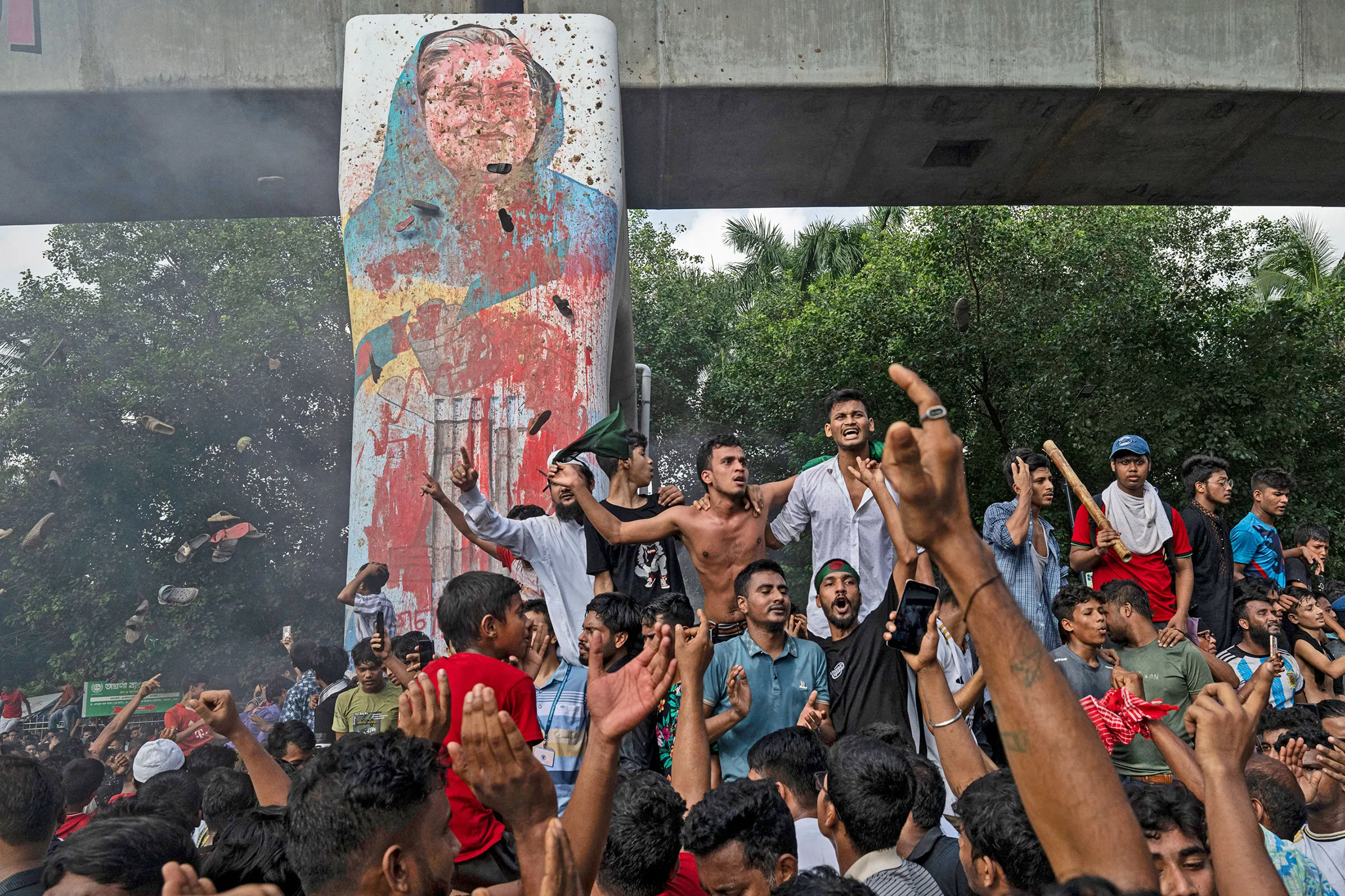 Protesters in Dhaka celebrate the fall of Sheikh Hasina's government during the July 2024 uprising